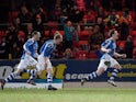 St Johnstone's Liam Craig is joined by team mates after grabbing a late equaliser against Dundee United on April 1, 2013