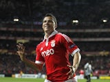 Benfica's Lima celebrates a goal against Newcastle on April 4, 2013