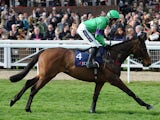 Mon Mome ridden by jockey Aidan Coleman goes to post before the JLT Specialty Handicap Chase on March 13, 2012
