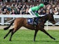 Mon Mome ridden by jockey Aidan Coleman goes to post before the JLT Specialty Handicap Chase on March 13, 2012