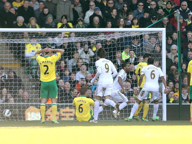 Swansea City's Luke Moore celebrates after scoring against Norwich on April 6, 2013