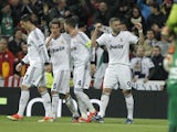 Real Madrid's Karim Benzema celebrates after scoring his side's second goal in their Champions League match against Galatasaray on April 3, 2013