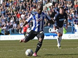 Sheffield Wednesday's Leroy Lita scores from the penalty spot against Blackburn Rovers on April 6, 2013