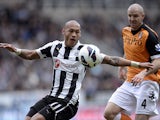 Yoan Gouffran and Philippe Senderos battle for the ball on April 7, 2013