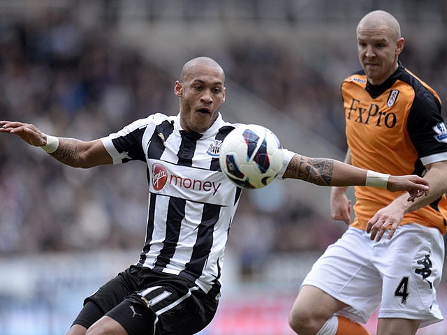 Yoan Gouffran and Philippe Senderos battle for the ball on April 7, 2013