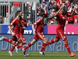 Bayern Munich's Jerome Boateng celebrates scoring against FC Nuremberg on April 13, 2013