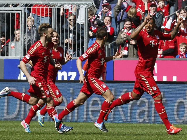 Bayern Munich's Jerome Boateng celebrates scoring against FC Nuremberg on April 13, 2013