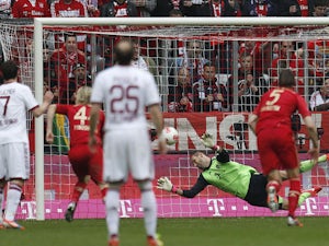 Bayern Munich goalkeeper Tom Starke saves a penalty during the match with FC Nuremberg on April 13, 2013