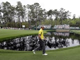Englishman David Lynn walks to the 15th green on day one of The Masters on April 11, 2013 