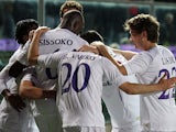 Fiorentina's David Pizarro is mobbed by teammates after scoring the opening goal against Atalanta on April 13, 2013