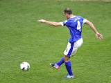 Everton's Darron Gibson scores against QPR in the Premier League clash on April 13, 2013