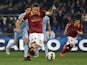 Roma captain Francesco Totti scores a penalty against Lazio on April 8, 2013