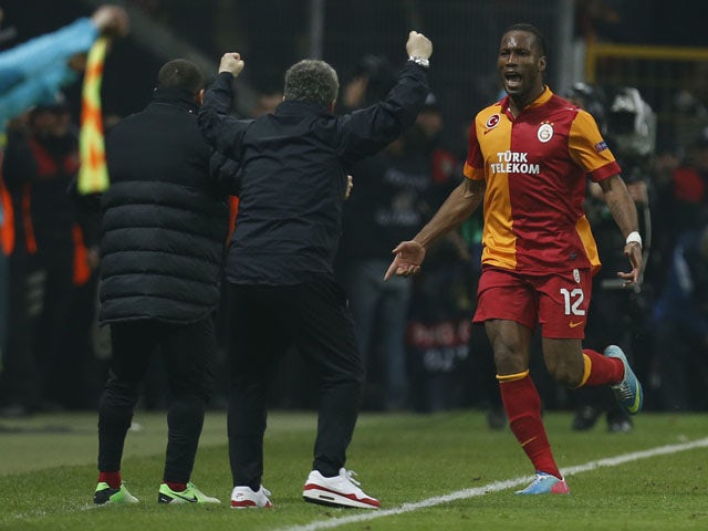 Galatasaray's Didier Drogba celebrates scoring against Real Madrid on April 9, 2013