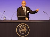 UEFA Sec Gen Gianni Infantino addresses an audience on September 24, 2012