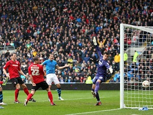 Cardiff lead 10-man Forest