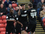 Charton's Johnnie Jackson is congratulated by teammates after scoring his team's second against Barnsley on April 14, 2013