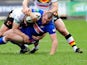Wakefield Wildcat's Justin Poore is tackled during his side's match against the Bradford Bulls on February 3, 2013