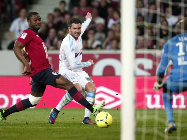 Marseille's forward Andre-Pierre Gignac has a shot on goal during the Ligue 1 clash with Lille on April 14, 2013