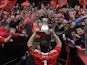 Munster's Marcus Horan carries the trophy following the Magners League Final on May 28, 2011