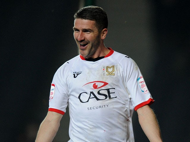Lowe cancels MK Dons contract