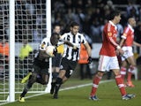 Newcastle's Papiss Cisse grabs the ball after scoring against Benfica on April 11, 2013