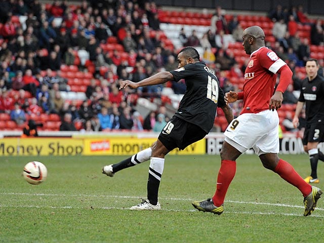 Charlton's Ricardo Fuller scores his team's sixth in the match against Barnsley on April 13, 2013