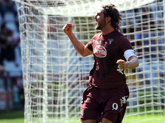 Torino's Rolando Bianchi celebrates a goal against Roma on April 14, 2013