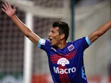 Tigre's Ruben Botta celebrates after scoring in the match against Deportivo Anzoategui on January 29, 2013