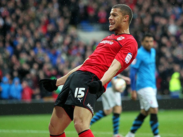 Cardiff's Rudy Gestede celebrates scoring his team's second goal in the match against Nottingham Forest on April 13, 2013