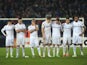 Spurs players stand dejected after losing on penalties to Basel on April 11, 2013