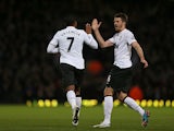 Antonio Valencia celebrates with teammate Michael Carrick after scoring the equaliser against West Ham on April 17, 2013