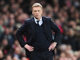 Everton manager David Moyes watches his side's match against Arsenal on April 16, 2013