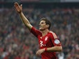 Bayern's Mario Gomez celebrates after scoring during the German Cup semi final against Wolfsburg on April 16, 2013
