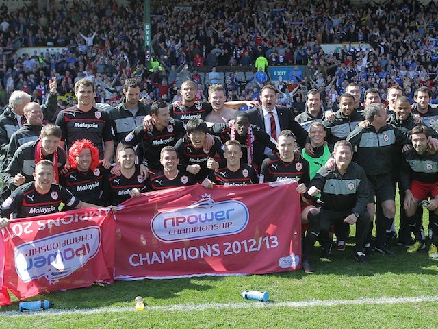 Cardiff celebrate being promoted as champions of the Npower Championship on April 20, 2013