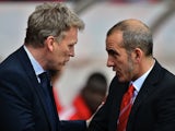 Opposing bosses David Moyes and Paulo Di Canio greet each other before the game on April 20, 2013