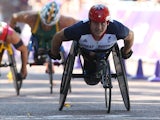 Great Britain's David Weir crosses the line to win gold in the Men's Marathon T54 on September 9, 2012
