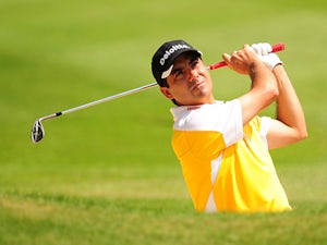 Aguilar shares lead in Spain