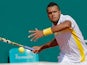Jo-Wilfried Tsonga returns the ball during the match against Jurgen Melzer in the Monte Carlo Masters on April 18, 2013