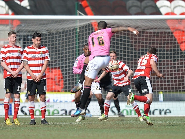 Notts County's Joss Labadie scores a goal against Doncaster on April 20, 2013