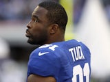 Justin Tuck of the New York Giants stands on the sideline during the NFL match with the Dallas Cowboys on October 28, 2012