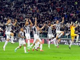 Juventus' players celebrate their win over AC Milan in the Serie A clash on April 21, 2013