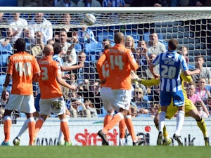 Brighton's Matt Upson scores against Blackpool on April 20, 2013
