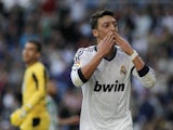 Real Madrid's Mesut Ozil celebrates a goal against Real Betis on April 20, 2013