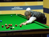 Michael White in action in his match against Mark Williams during the Snooker World Championship on April 21, 2013