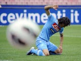 Napoli's Edinson Cavani reacts after missing a scoring chance in the match against Cagliari on April 21, 2013