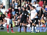 Arsenal's Olivier Giroud is shown a straight red card in a game against Fulham on April 20, 2013