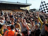 Port Vale fans invade the pitch after the club won promotion to League One on April 20, 2013