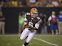 Cleveland Browns quarterback Seneca Wallace scrambles against the Chicago Bears on August 30, 2012