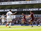 Manchester City's Samir Nasri scores against Tottenham Hotspur in the Premier League match on April 21, 2013