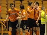 Wolverhampton Wanderers' Kevin Doyle celebrates scoring against Hull City in the Championship match on April 16, 2013